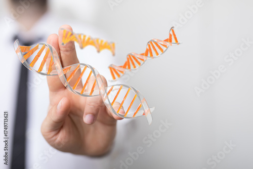 Hand holding digital DNA st...