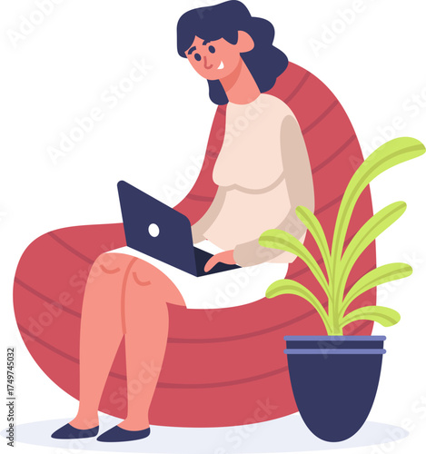 Woman working on laptop while relaxing in beanbag