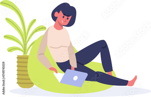 Woman relaxing at home working on laptop