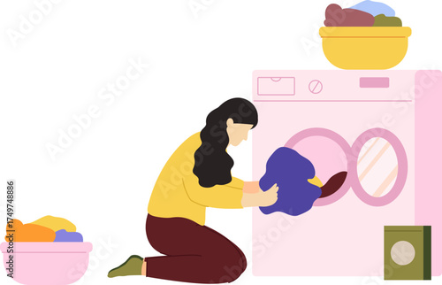 Woman doing laundry filling washing machine clothes