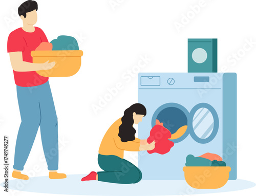 Couple working together doing laundry chores at home