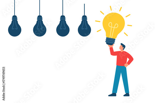 Man holding bright glowing light bulb among unlit ones