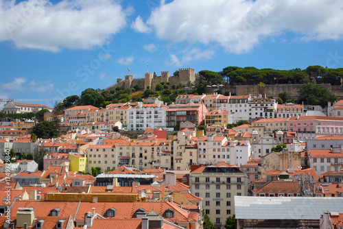The colors of Lisbon, Portugal, in summer, sun, washed tiles, pastel facades, and the golden glow that turns every hill into a postcard