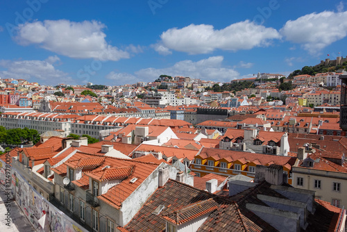 The colors of Lisbon, Portugal, in summer, sun, washed tiles, pastel facades, and the golden glow that turns every hill into a postcard