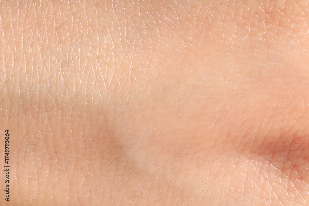 Fototapeta premium Human skin, closeup view. Detailed texture of surface