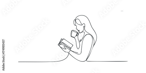 Woman drinking coffee while reading a book