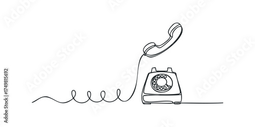 Vintage rotary telephone with handset lifted