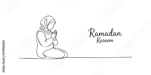 Person praying in hijab for Ramadan celebration