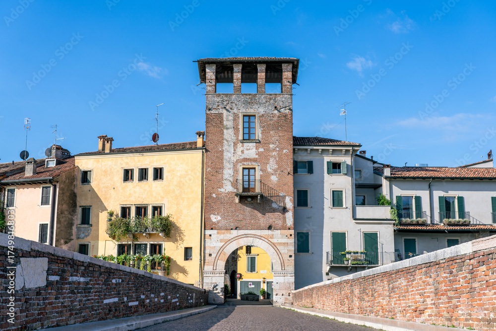 Fototapeta premium Ponte Pietra Bridge and Buildings at the Entrance to the Historic Section of Verona Italy
