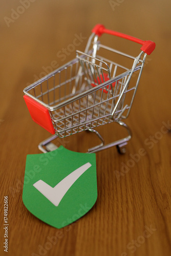 Shopping cart with green sh...