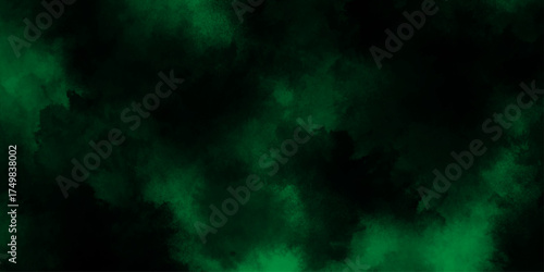 Abstract dark green or black watercolor texture, dresembling a nebula or cosmic cloud formation, lime green smoke or fog on a black background, old vintage grunge design green Christmas background.
