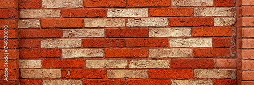 Wallpaper Mural Panoramic image. Brick wall with light red and dark red bricks Torontodigital.ca