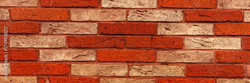 Wallpaper Mural Panoramic image. Brick wall with light red and dark red bricks Torontodigital.ca