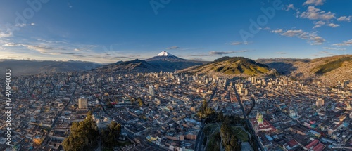 Aerial view of Quito nestled in the Andes, with vibrant city streets below and Cotopaxi volcano rising in the distance under golden sunlight.