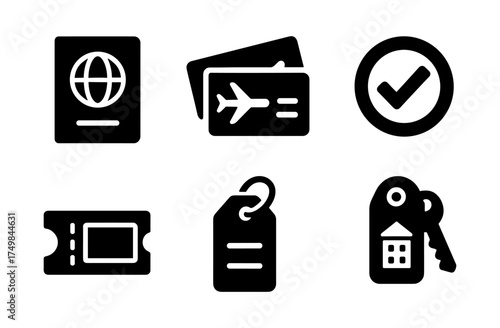 Travel icons set with passport, tickets, and checkmark in black silhouette style