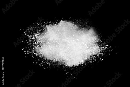 White powder explosion on black background.