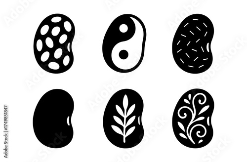 Abstract black and white beans with patterns and symbols