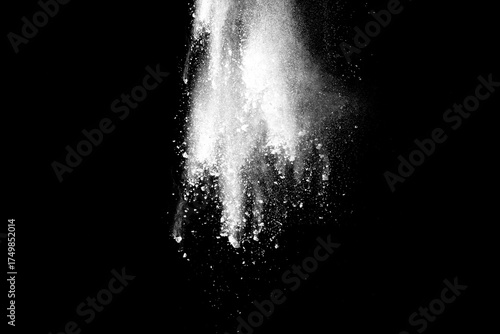 White powder explosion on black background.