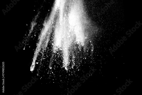White powder explosion on black background.