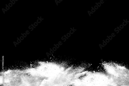 White powder explosion on black background.