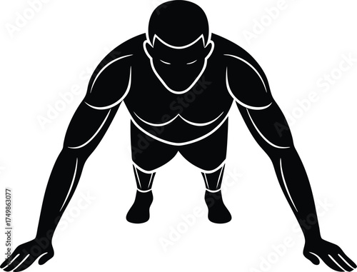 Strong man in a dynamic overhead view performing a push up exercise during his intensive workout