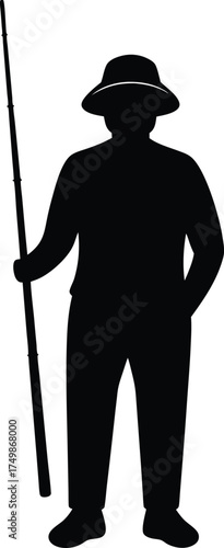A person wearing a hat stands holding a long fishing rod prepared for casting