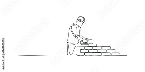 Mason building wall with bricks and mortar