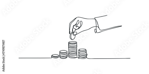 Hand stacking coins in increasing piles