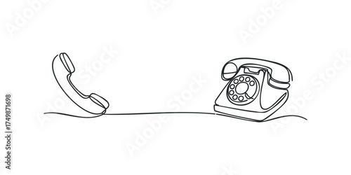 Vintage rotary telephone with receiver off the hook