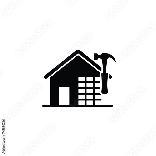 Black silhouette of a house under construction with a hammer and building materials