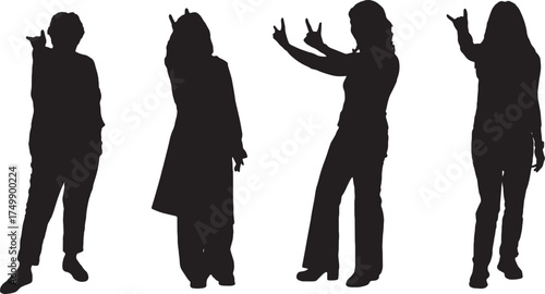 vector, silhouette of a group of women showing the horns sign with fingers