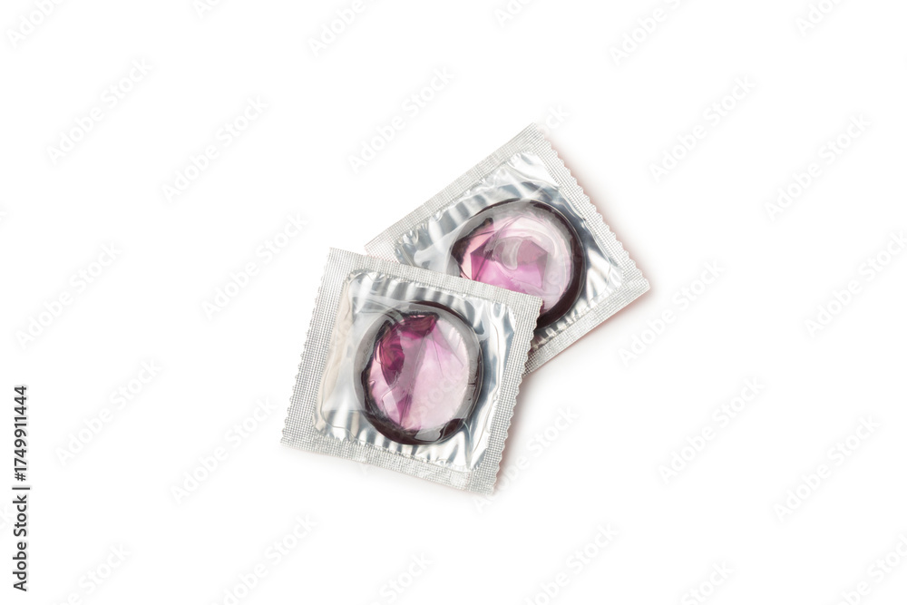 Fototapeta premium Condoms isolated on white background. Colorful fruit-colored condoms in packaging. Safe sex concept. Contraceptive. Different birth control methods. Aids prevention. World AIDS Day. Sexual health.