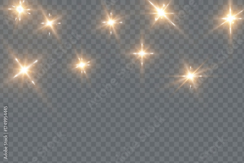 Christmas light effect. Sparkling magical dust particles.The dust sparks and golden stars shine with special light.