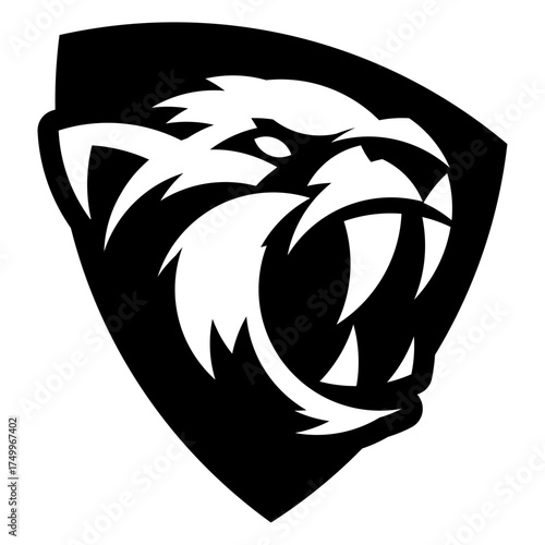 A monochrome roaring tiger inside a dark shield, combining elegance and intimidation, perfect for a strong team emblem.