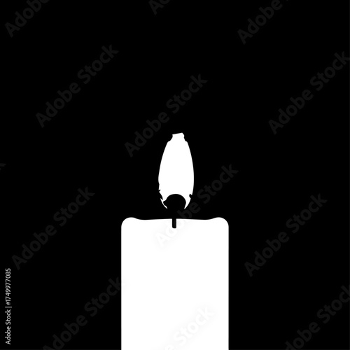 Simple White Candle with Flame Burning Brightly Against Black Background.