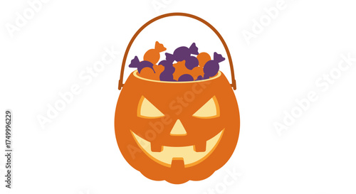 Halloween pumpkin candy bucket filled with assorted sweets and treats isolated on white for festive autumn celebrations isolated on white background
