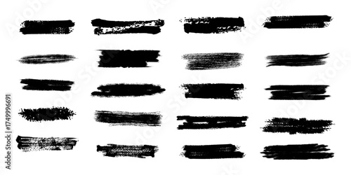 Collection of twenty abstract black paint brush stroke textures and grunge elements on a white background