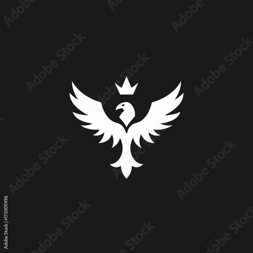Regal winged creature with crown logo design. Abstract royal bird emblem symbol of power, freedom, majesty, and strength on a dark background.