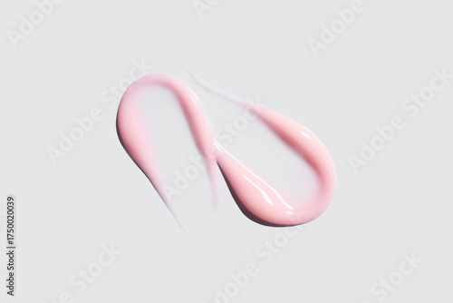 Pink cosmetic smear of cream texture on a light background. Skin care.