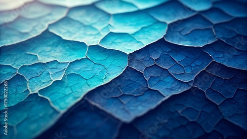 Abstract close up macro texture of overlapping scales in varying shades of deep blue and turquoise