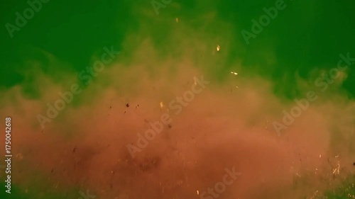 Dynamic burst of vibrant sparks igniting against a lush green background, perfect for adding energy and excitement to your project, with a unique visual flair