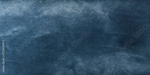 Dark blue grunge wall texture background with a vintage, aged, and rough surface design