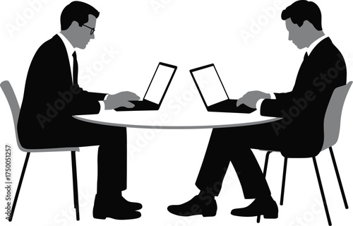 Two businessmen working on laptops at a table, showcasing modern business and technology integration