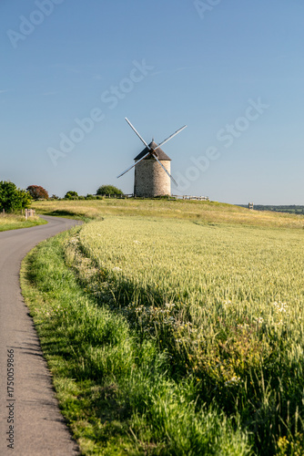 Moulin de Moidrey, view of an old mill built of stone, France, Pontorson 