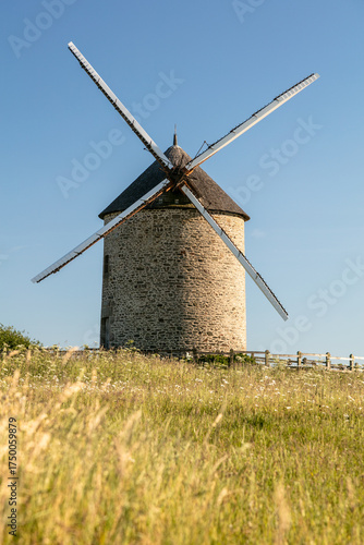 Moulin de Moidrey, view of an old mill built of stone, France, Pontorson 