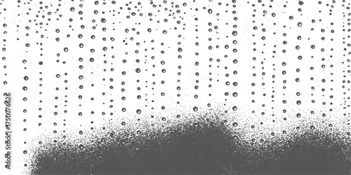 Black and white pattern of rain drops on a wet window glass surface
