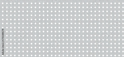 Polka dot pattern on textured light background