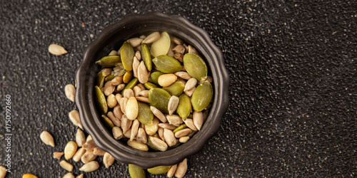 Seed mix sunflower seeds and pumpkin seeds natural product tasty snack fresh delicious gourmet food background on the table rustic top view copy space keto and paleo diet vegan and vegan food