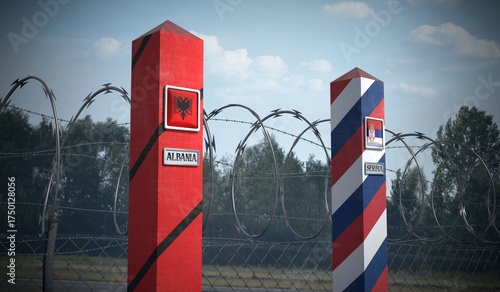 Obraz na płótnie Border posts with flags of Albania and Serbia - 3d illustration