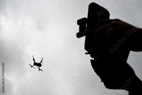 Drone is flying in the sky. Operator controls the drone.  War in Ukraine
